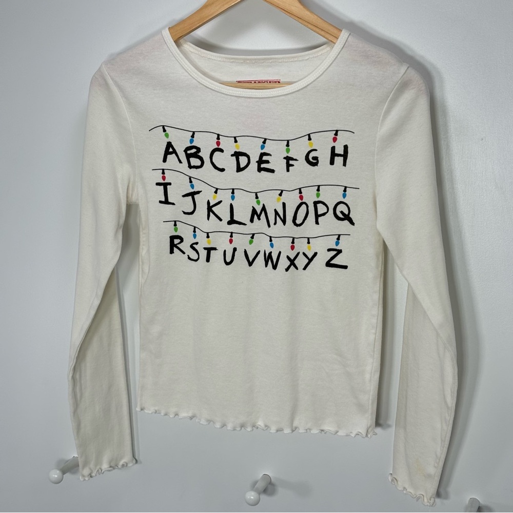 Stranger Things Girls Size M Letters Long Sleeve Ivory ruffle Cotton/Polyester